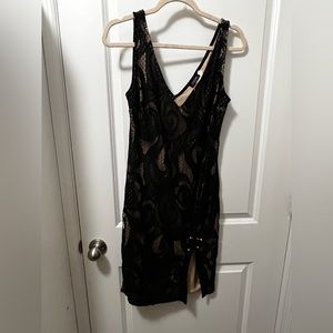 Beautiful lace detailed dress with open slit for leg